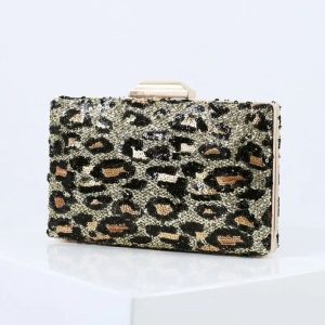 Pochette léopard dorée minaudière.